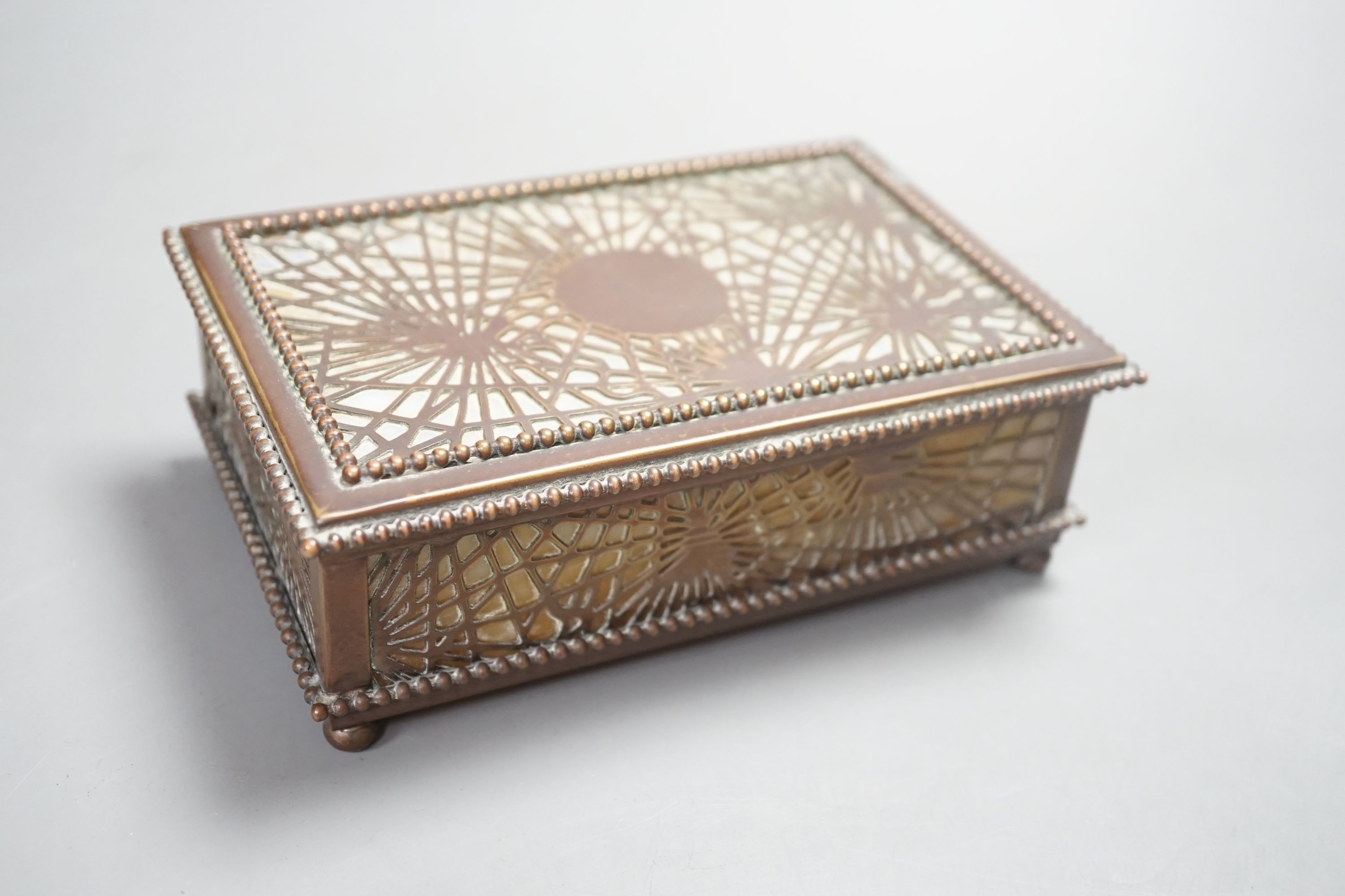 A Tiffany Studios box, pine needles pattern, 15 cms wide x 5cms high.